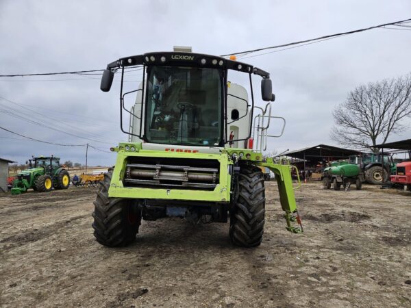 Combină Claas Lexion 670 4X4 Montana - imagine 21