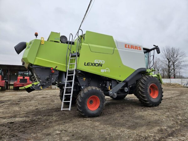 Combină Claas Lexion 670 4X4 Montana - imagine 24